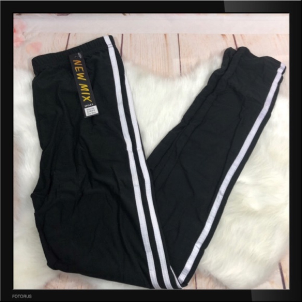 Black leggings with white stripes